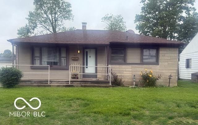 417 Kessler Blvd, Seymour, IN 47274 - view of front of house featuring a front yard and roof with shingles