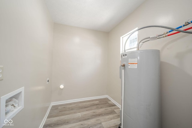 utility room with water heater