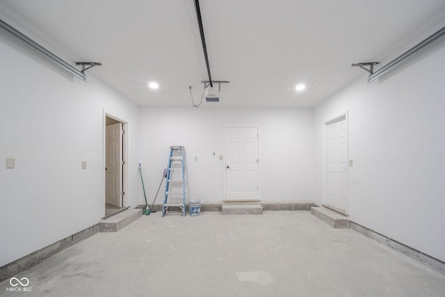 garage featuring a garage door opener