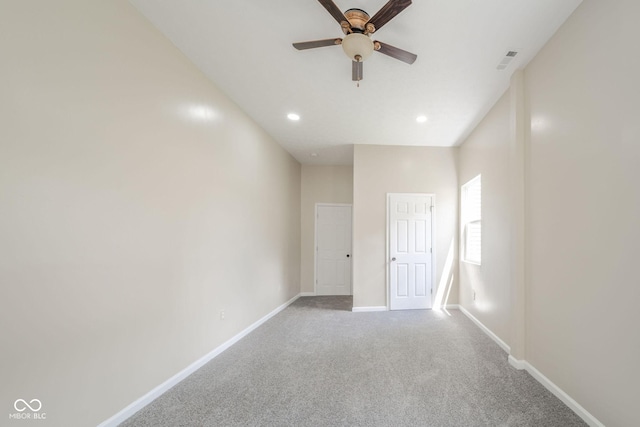 unfurnished room with carpet, recessed lighting, visible vents, ceiling fan, and baseboards