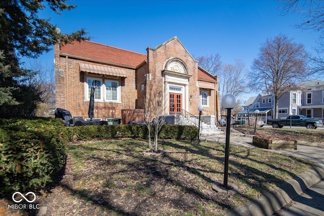 view of front of property with brick siding