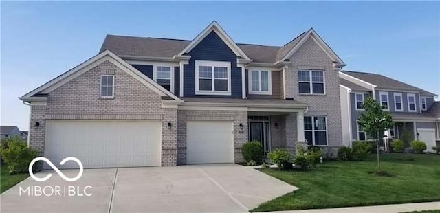 view of front facade with a front yard, concrete driveway, brick siding, and an attached garage