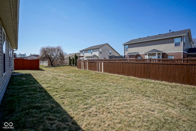 view of yard with fence