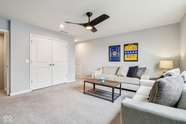 carpeted living room featuring recessed lighting, visible vents, ceiling fan, and baseboards