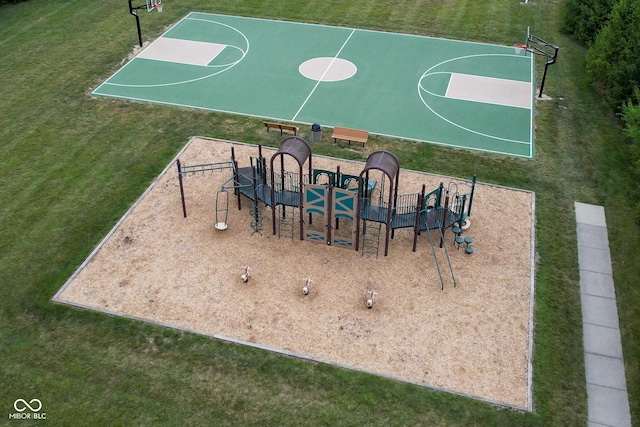 view of basketball court with community basketball court, playground community, and a yard