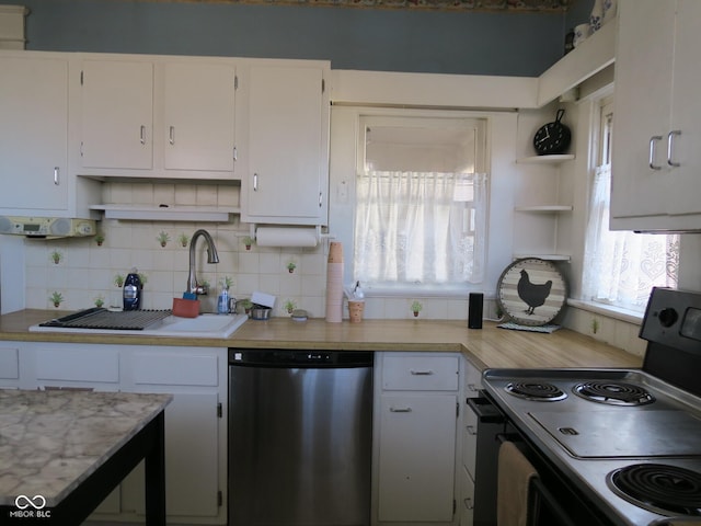 kitchen featuring dishwasher, open shelves, range with electric stovetop, and light countertops