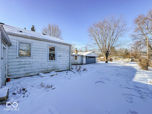 exterior space featuring a garage