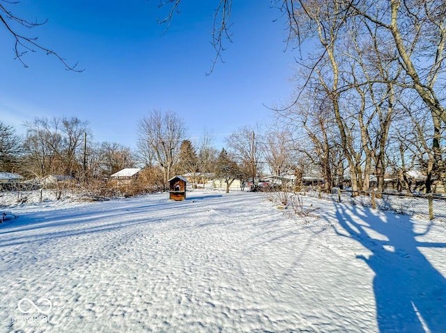 view of yard covered in snow