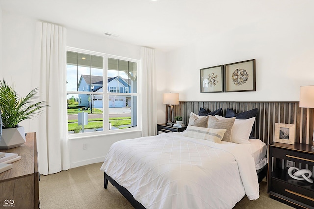 bedroom with carpet and visible vents