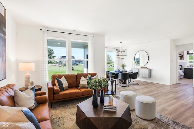 living room featuring plenty of natural light and light wood-style floors