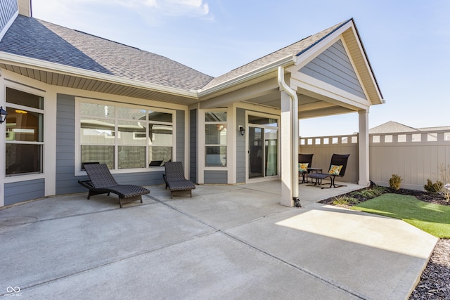 view of patio with fence