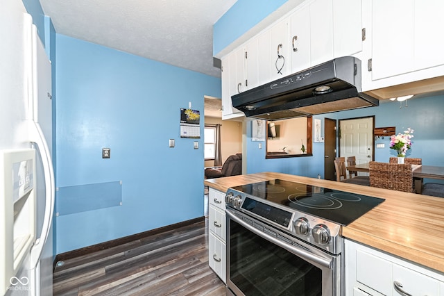 kitchen with dark wood-style floors, stainless steel electric range oven, wooden counters, a textured ceiling, and exhaust hood