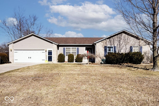 single story home featuring a front yard, brick siding, driveway, and an attached garage