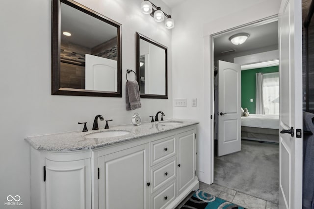 1413 S E St, Indianapolis, IN 46225 - full bath featuring double vanity, visible vents, ensuite bathroom, and a sink