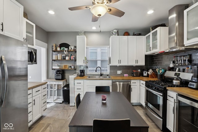1413 S E St, Indianapolis, IN 46225 - kitchen featuring a sink, beverage cooler, wooden counters, and stainless steel appliances