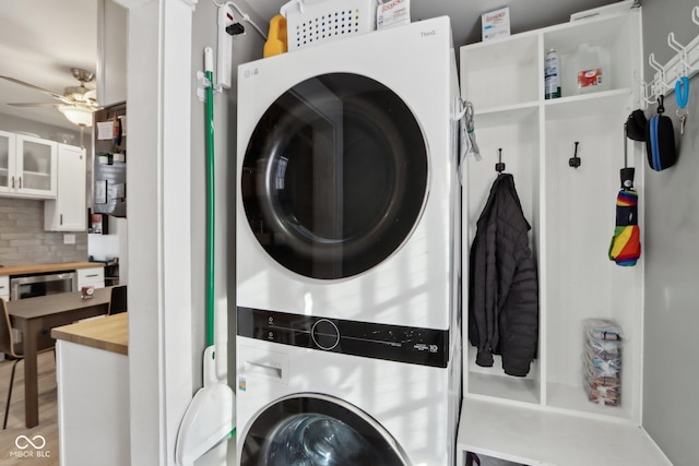 1413 S E St, Indianapolis, IN 46225 - clothes washing area with laundry area, stacked washer and clothes dryer, and ceiling fan