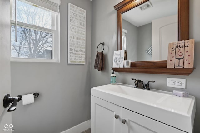 1413 S E St, Indianapolis, IN 46225 - bathroom with vanity, baseboards, and visible vents