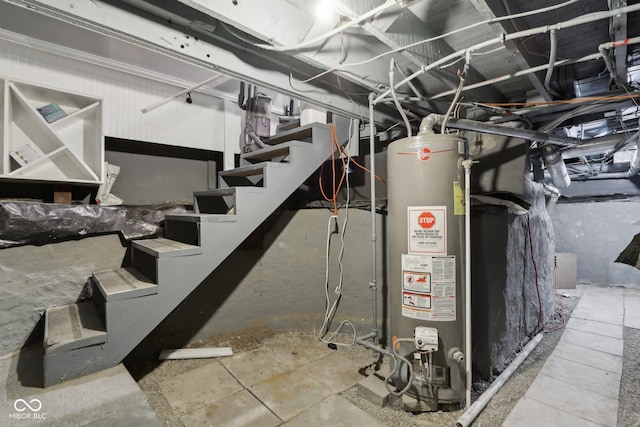 1413 S E St, Indianapolis, IN 46225 - unfinished below grade area featuring gas water heater and stairs