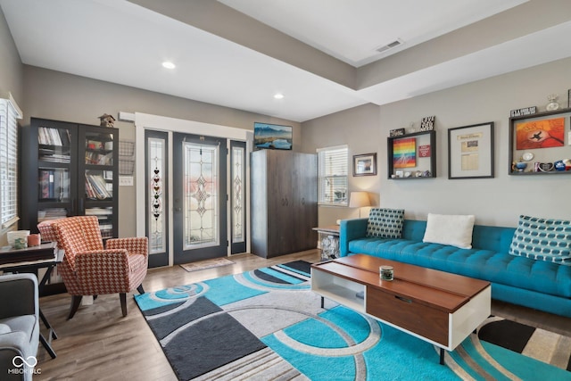 1413 S E St, Indianapolis, IN 46225 - living room featuring visible vents, recessed lighting, and wood finished floors