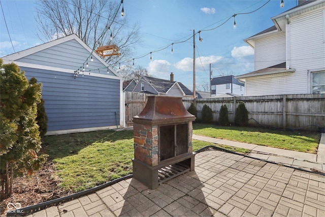 1413 S E St, Indianapolis, IN 46225 - view of patio / terrace with an outbuilding and a fenced backyard