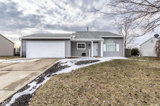 ranch-style home featuring a garage, driveway, a front lawn, and roof with shingles