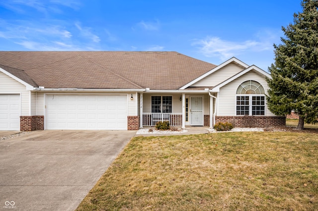 ranch-style home featuring covered porch, a front yard, concrete driveway, and brick siding