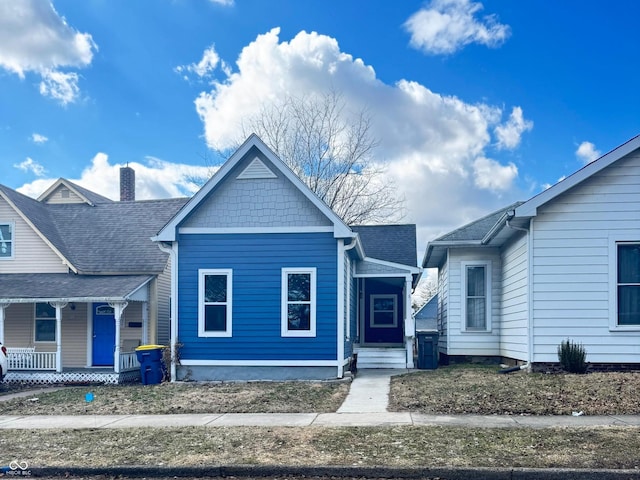 bungalow-style home with a porch