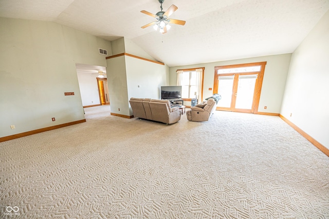 unfurnished living room featuring ceiling fan, carpet, visible vents, and baseboards