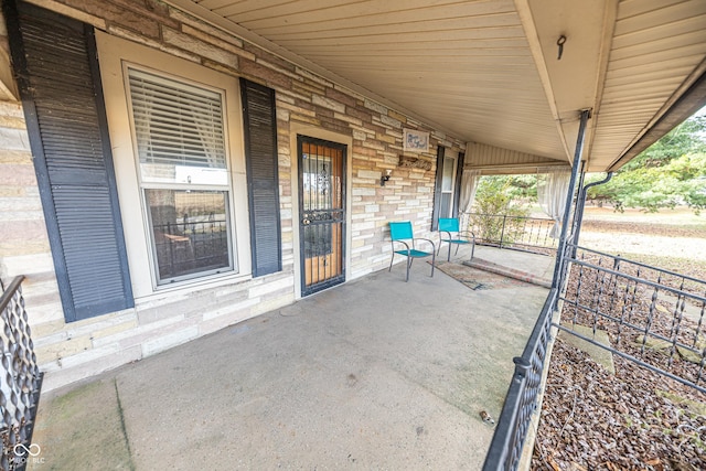 view of patio featuring covered porch