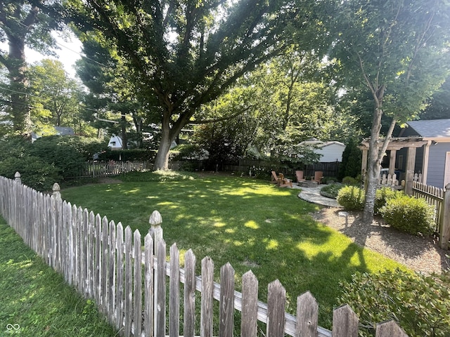 view of yard featuring fence private yard