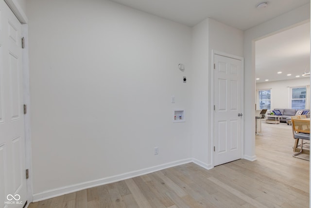 interior space featuring baseboards, recessed lighting, and light wood-style floors