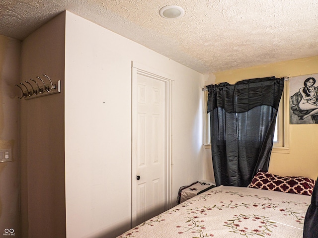 bedroom with a textured ceiling