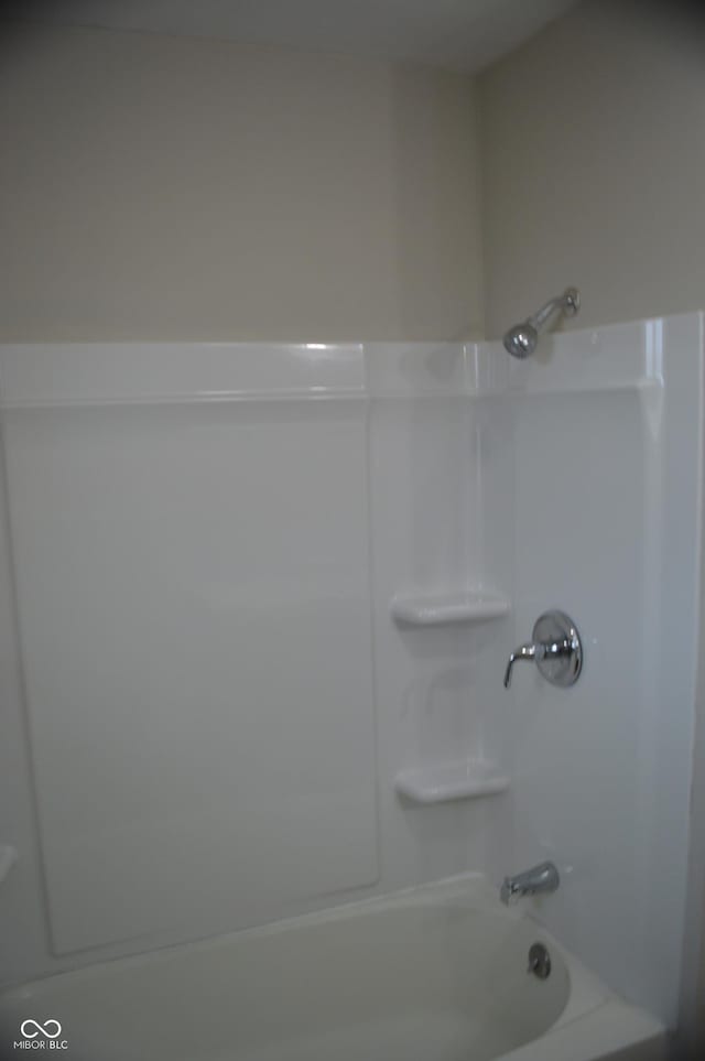 bathroom with shower / tub combination