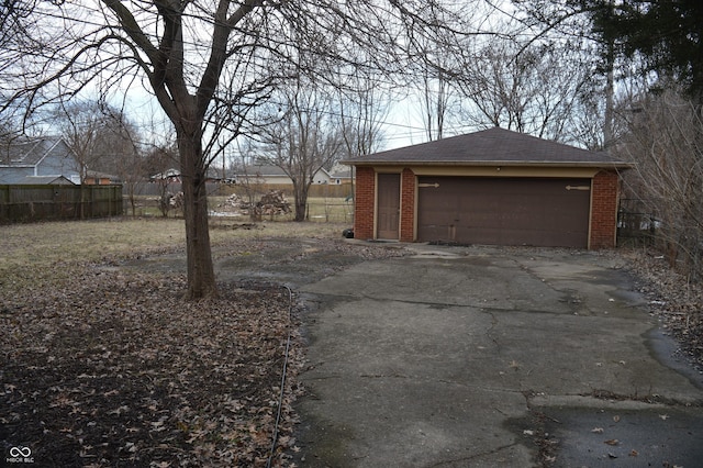 detached garage with fence