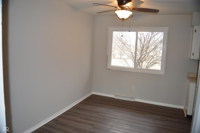 unfurnished dining area with a ceiling fan, dark wood-style flooring, visible vents, and baseboards