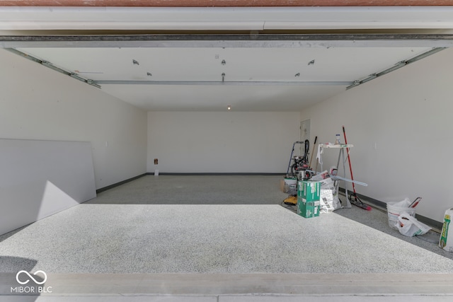 garage featuring baseboards