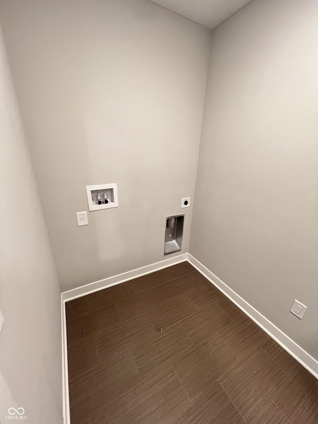 clothes washing area featuring laundry area, baseboards, washer hookup, and hookup for an electric dryer