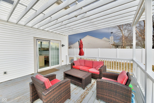 wooden terrace featuring outdoor lounge area, fence, and a pergola