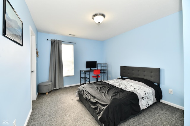 bedroom featuring carpet flooring, visible vents, and baseboards