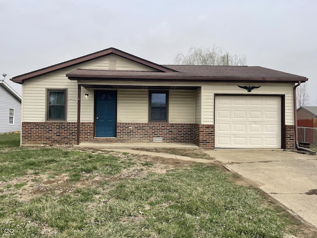 ranch-style home with brick siding, concrete driveway, and a garage