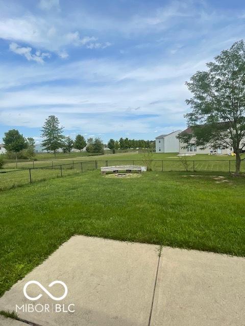 8249 Retreat Ln, Indianapolis, IN 46259 - view of yard featuring fence and a rural view