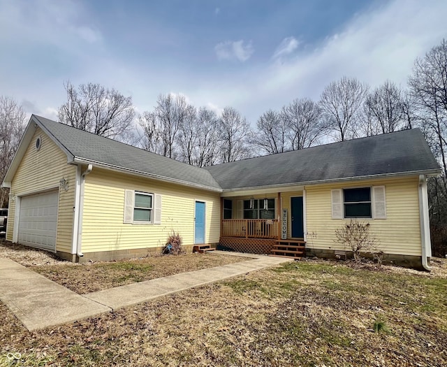 single story home featuring an attached garage and a porch