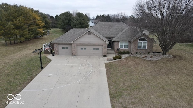 ranch-style home featuring an attached garage, a shingled roof, brick siding, driveway, and a front yard