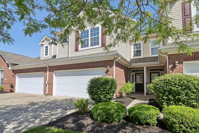 5682 Castor Way, Noblesville, IN 46062 - townhome / multi-family property with brick siding and driveway