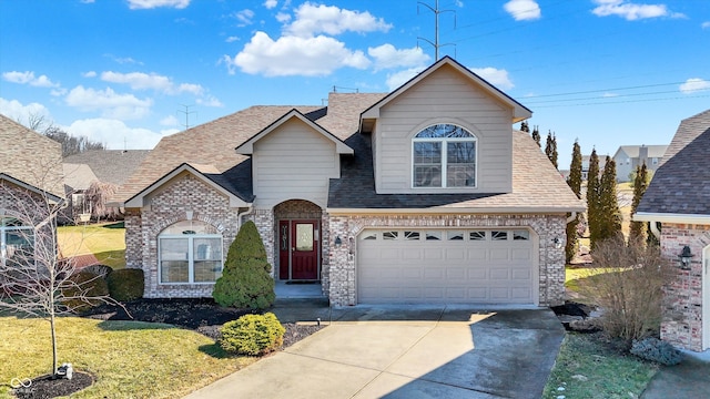 view of front of home with concrete driveway, a shingled roof, an attached garage, and brick siding