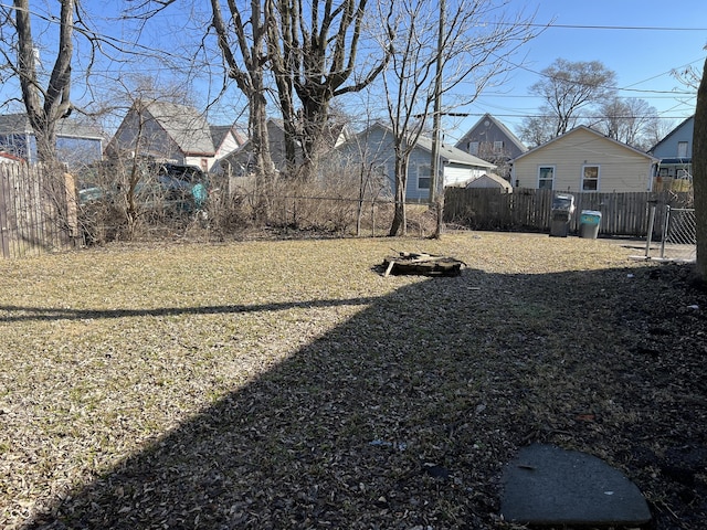 view of yard with fence and a residential view