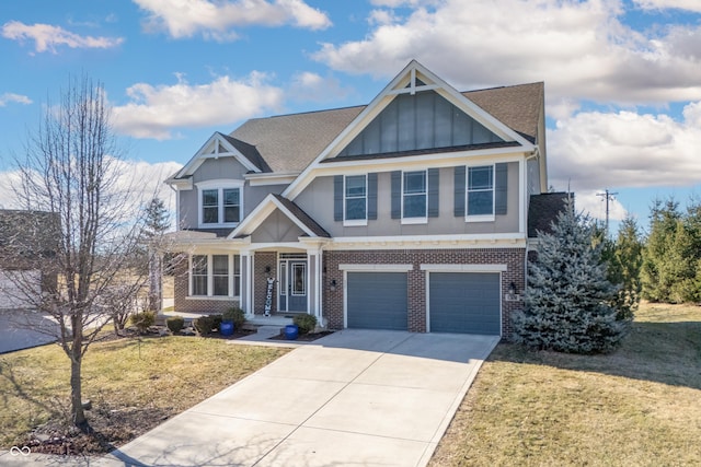 craftsman-style home featuring a garage, brick siding, driveway, board and batten siding, and a front yard