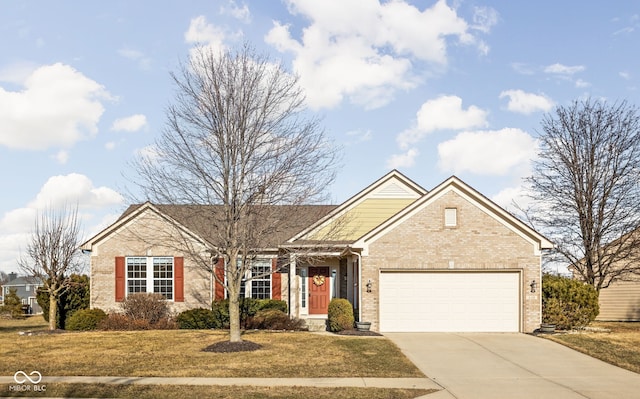 single story home featuring a garage, a front yard, concrete driveway, and brick siding