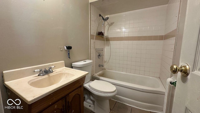 bathroom with shower / bath combination, toilet, and vanity