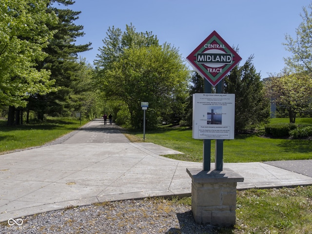 surrounding community featuring a yard